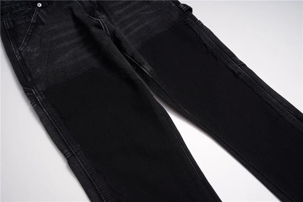 Women's micro flared patchwork raw edge jeans in black denim with loose straight tube fit, front view