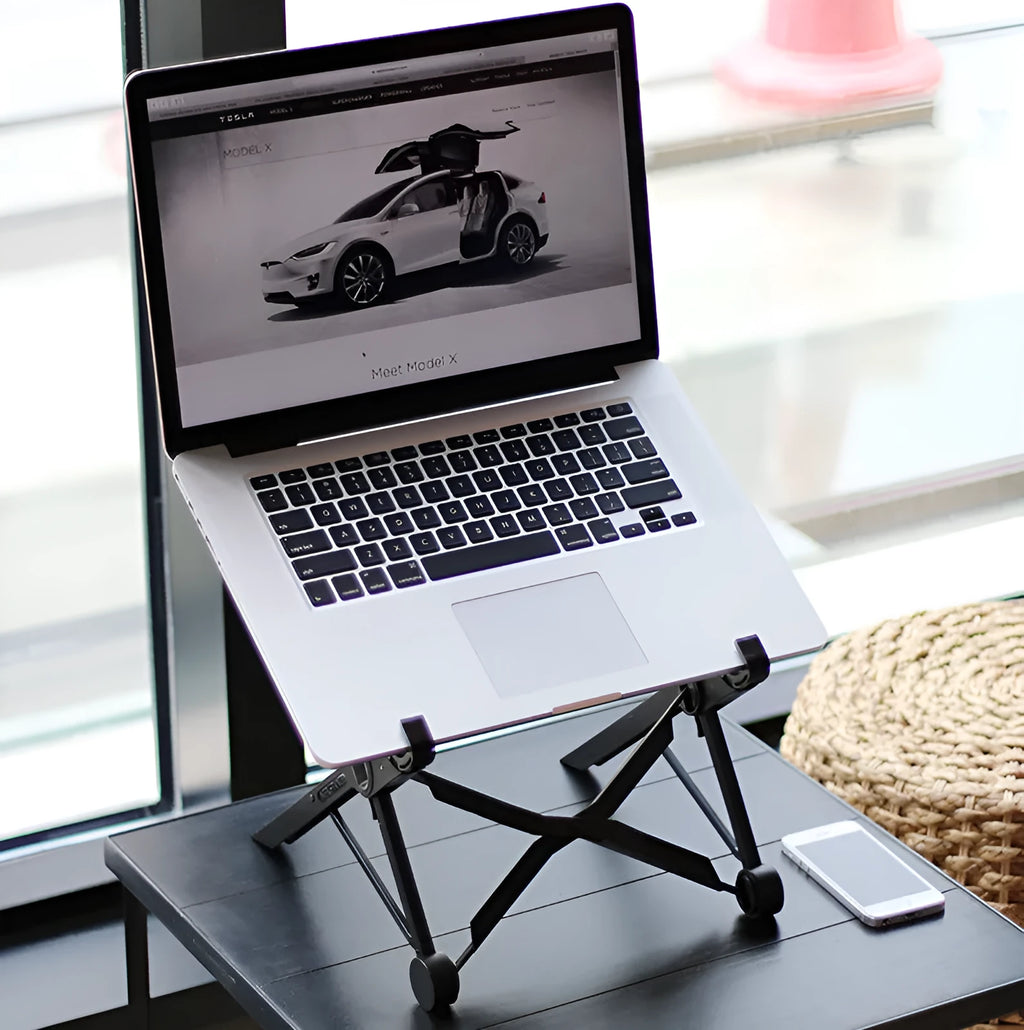 Black reinforced nylon folding laptop stand in open and closed positions