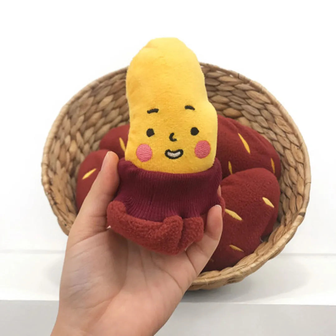Red sweet potato shaped dog puzzle toy with hidden treat compartment
