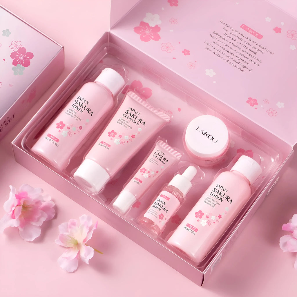 Cherry blossom skin care set with six facial products including cleanser, toner, cream, essence, and eye cream