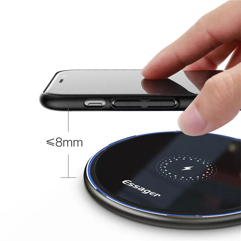 Black wireless charging pad with LED indicator for phones and headphones