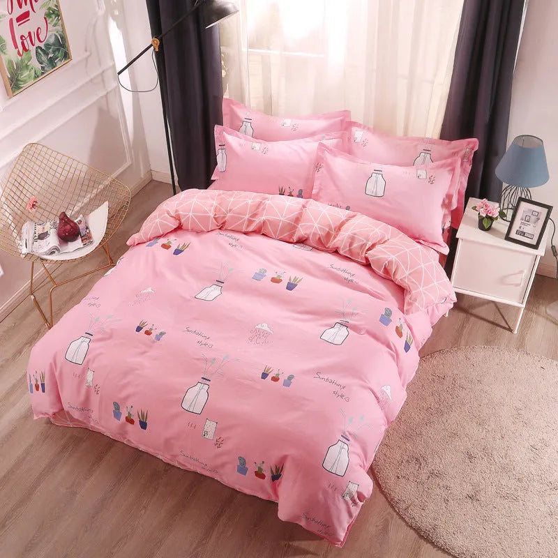 Cotton four-piece bedding set in multiple sizes with quilt cover, fitted sheet, and pillowcases