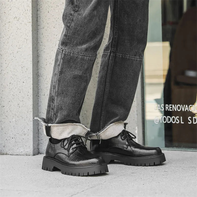 Black low top casual shoes with genuine leather upper, round toe, chunky heel and rubber sole.