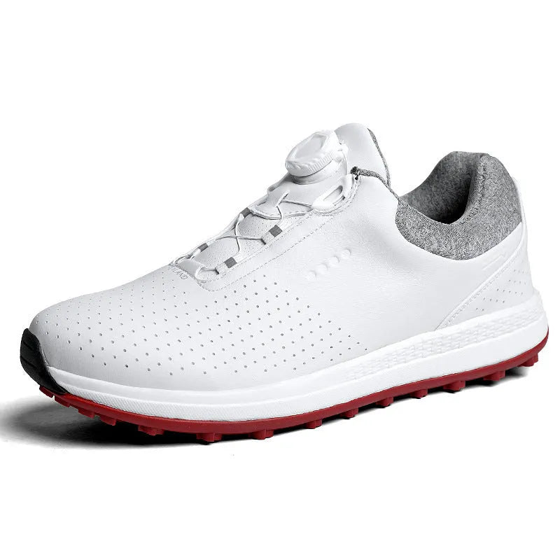 Men's white and black casual low-top golf shoes with breathable upper and traction sole.