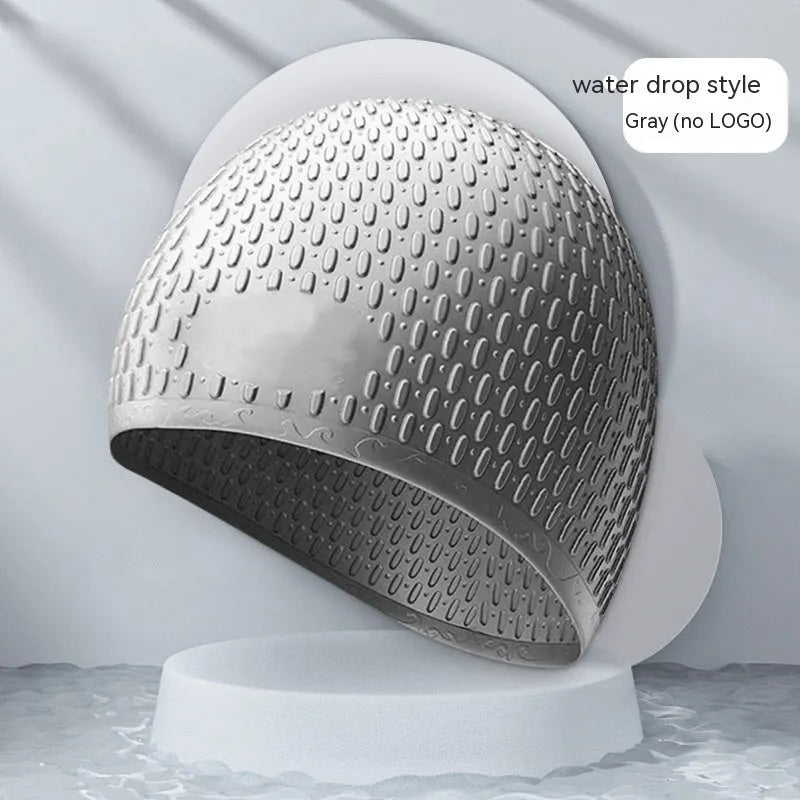 Solid colour silicone swimming cap with water drop design for adult swimmers