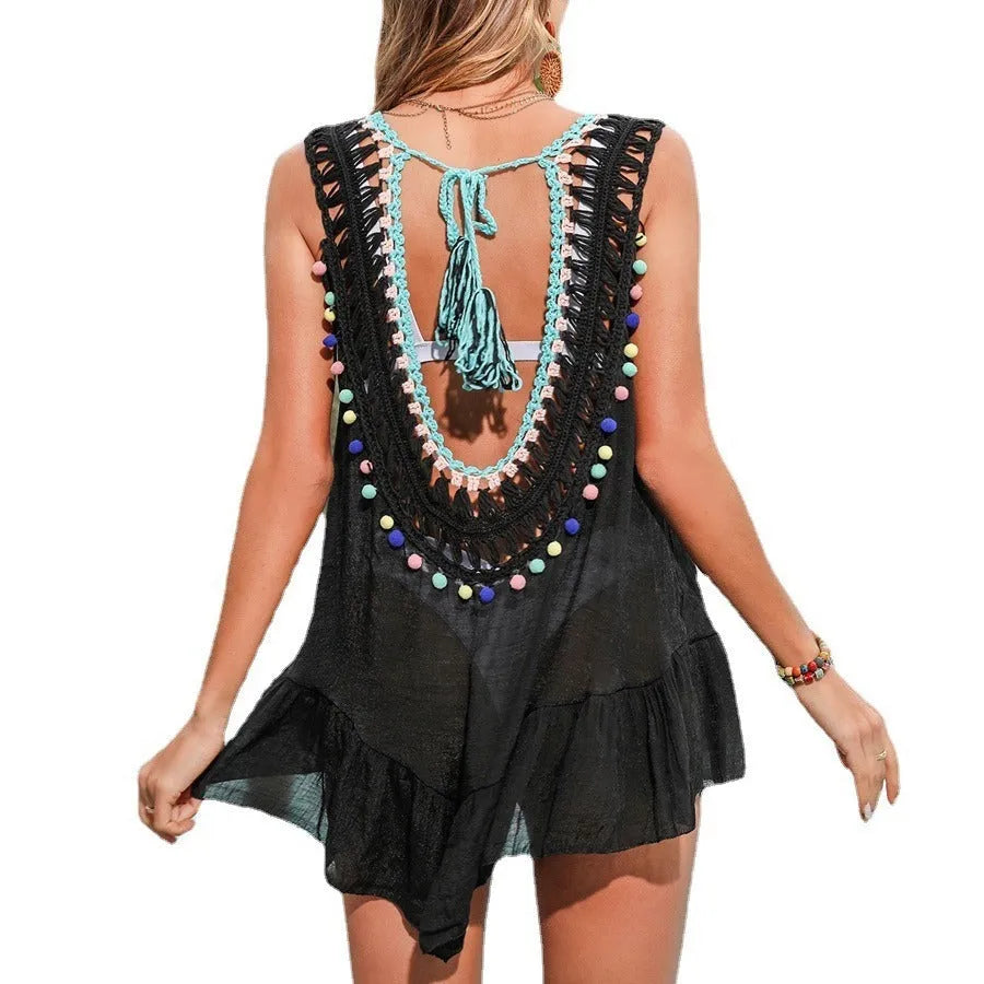 Black hand crocheted women's beach cover-up vest with cut-out detailing and ruffled design