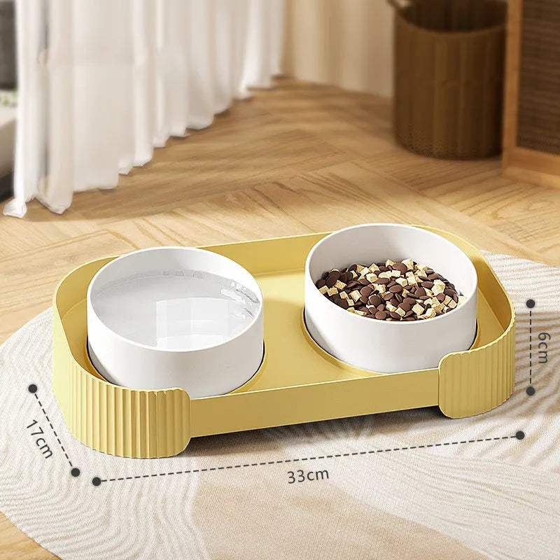 Green ceramic elevated cat bowl set with 15 degree tilt on a white base