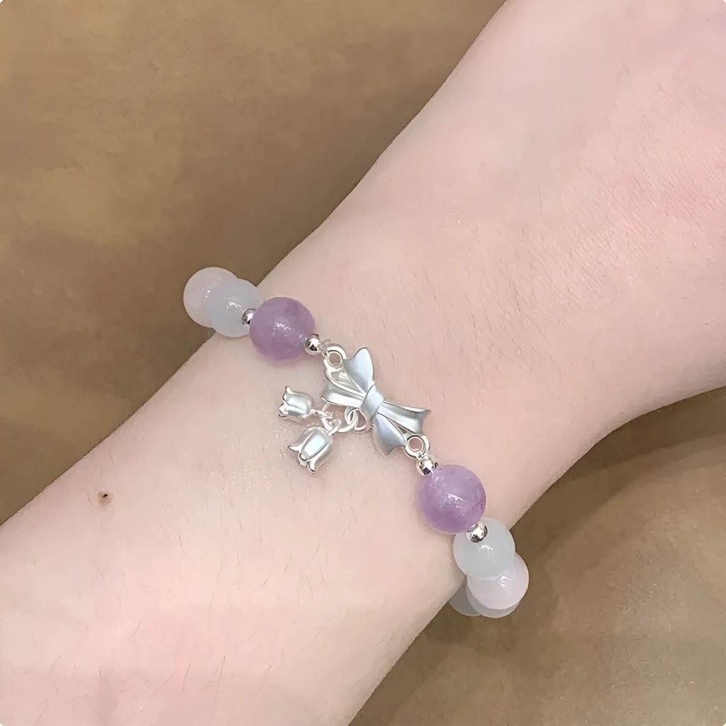 Lavender purple crystal bracelet with bow knot design measuring 10mm