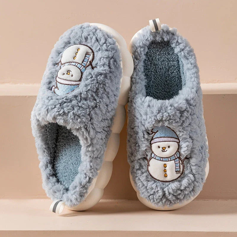 Cozy snowman-designed slippers with plush upper and anti-slip sole for indoor winter wear