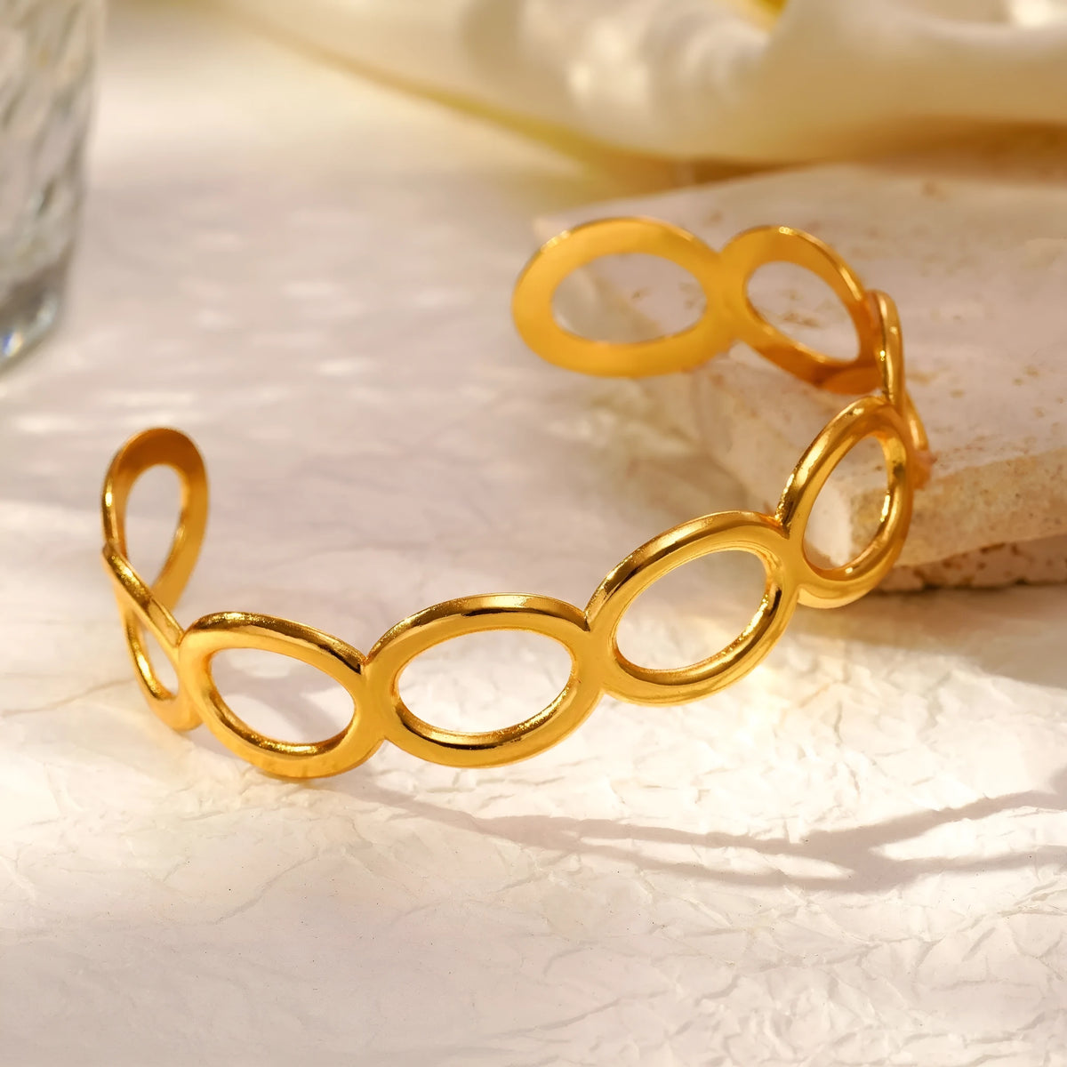 Gold open-ended stainless steel bracelet for women, geometric 13g cuff by Twilight Mountain