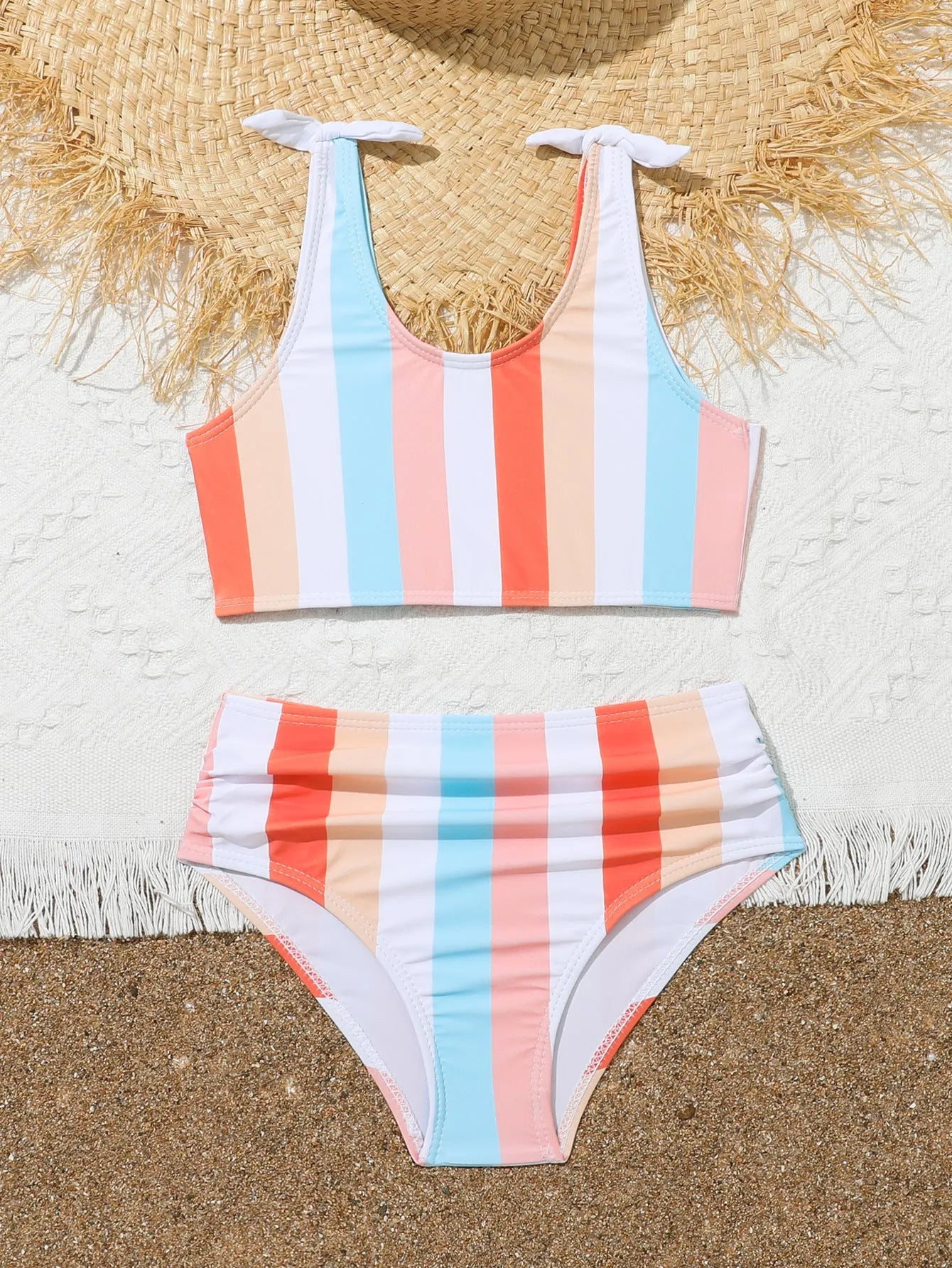 Girls' two-piece plaid print swimsuit with bra top and briefs for swimming.
