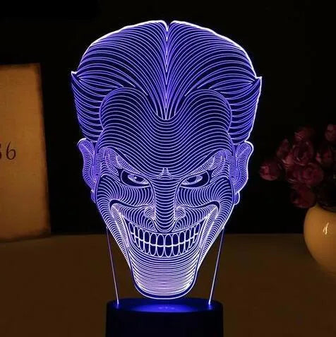 USB-powered 3D LED table lamp with remote control showing multiple colour options
