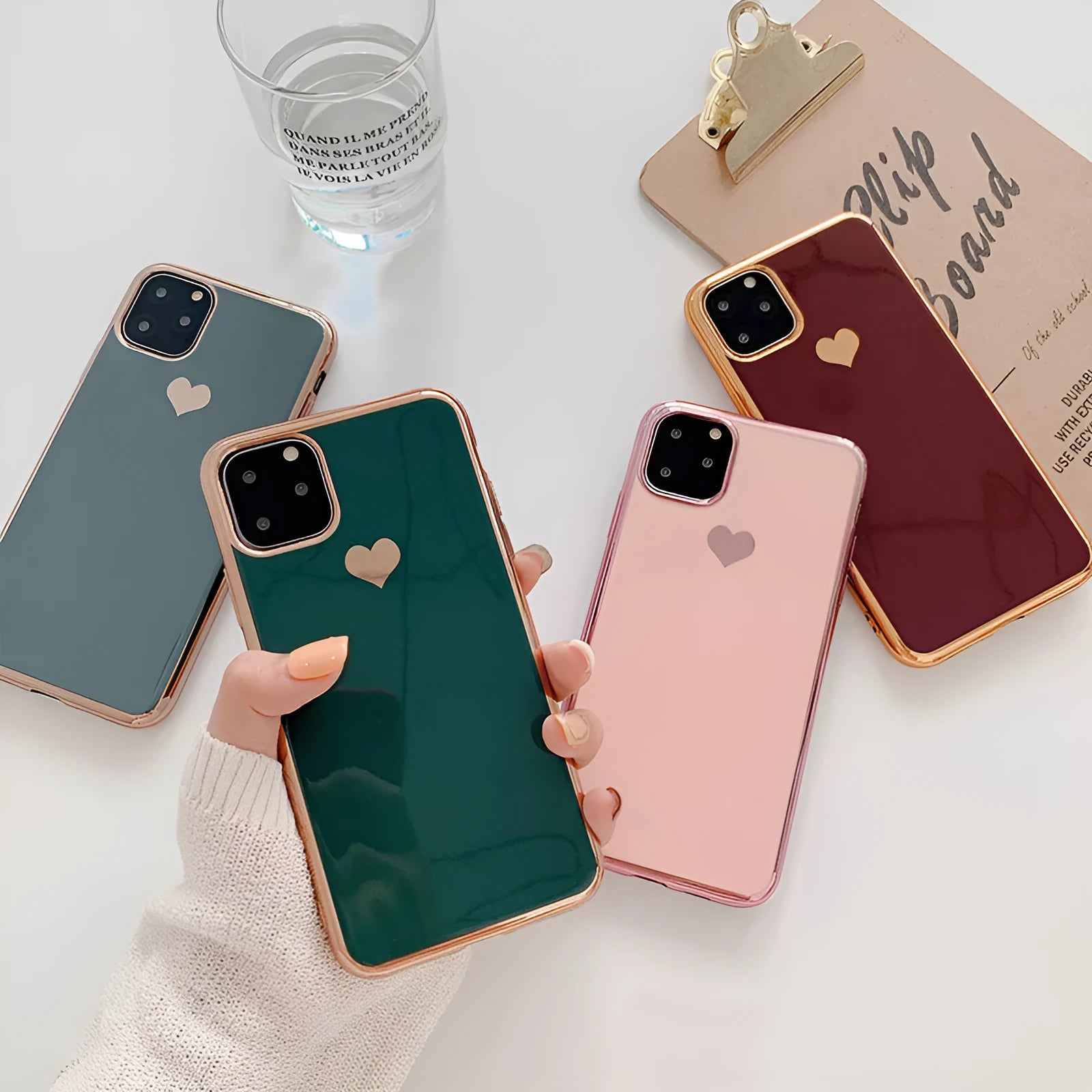 Solid colour TPU back cover phone case for iPhone in blue, claret, pink, or green.