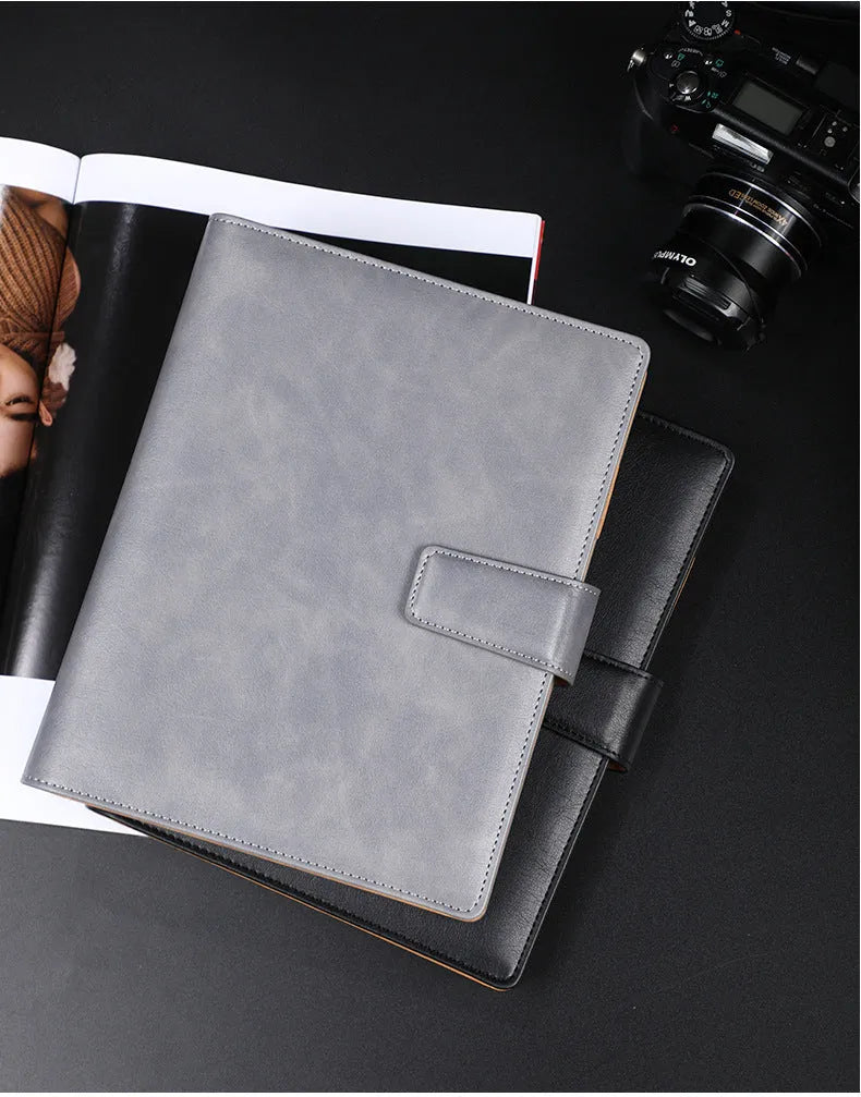 A5 leather notebook with 6-hole binder clip closure and hard cover