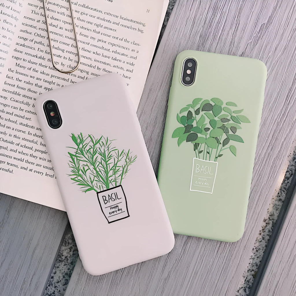 White silicone iPhone case with a detailed painted botanical plant design on the back.