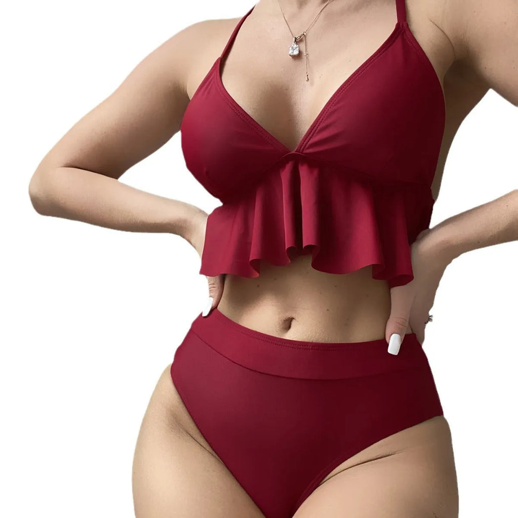 Women's solid colour split bikini swimsuit in polyester fabric on a mannequin