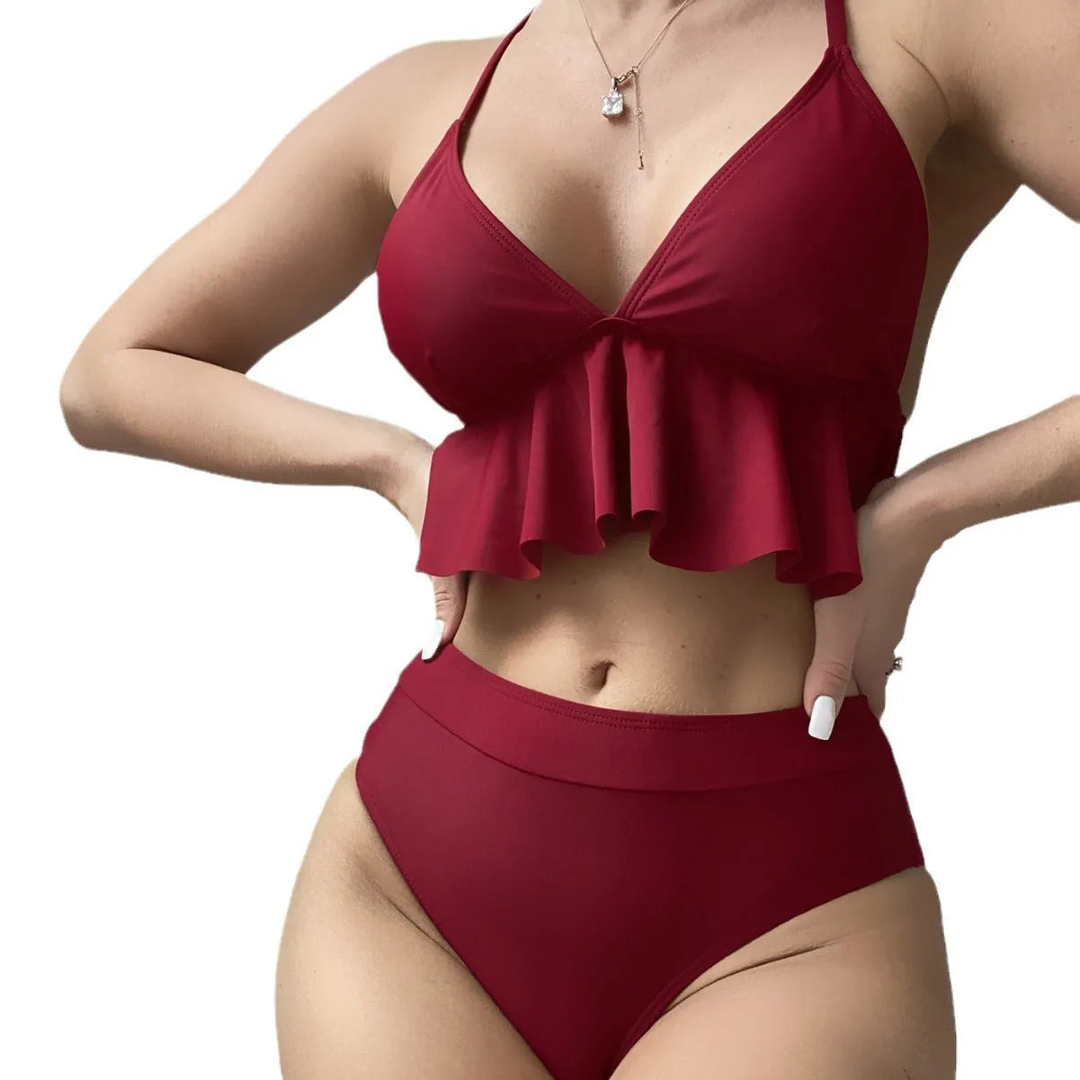 Women's solid colour split bikini swimsuit in polyester fabric on a mannequin