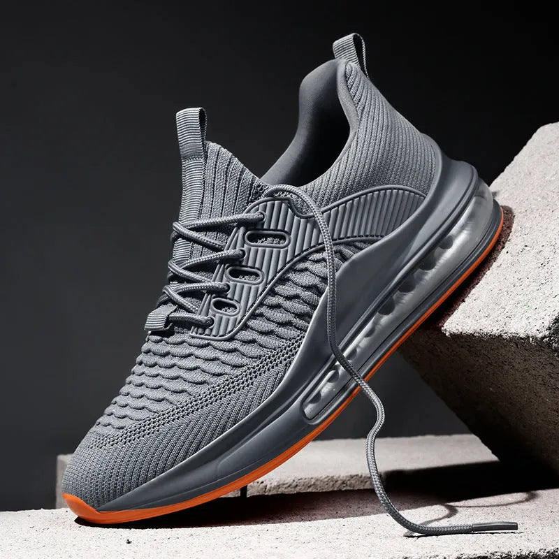 Men's low-top mesh sneaker in black with white sole and lace-up front.
