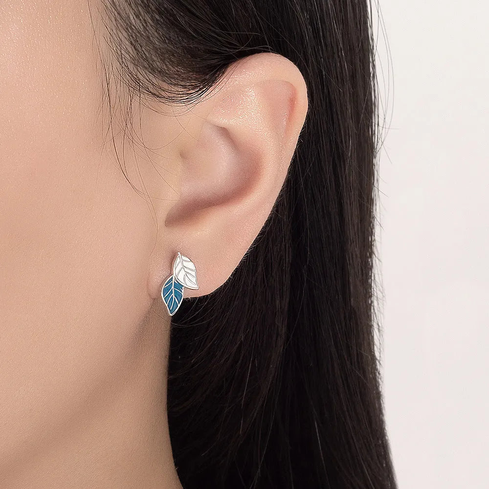 Leaf-shaped stud earrings for women in copper with white gold plating, geometric design, one pair