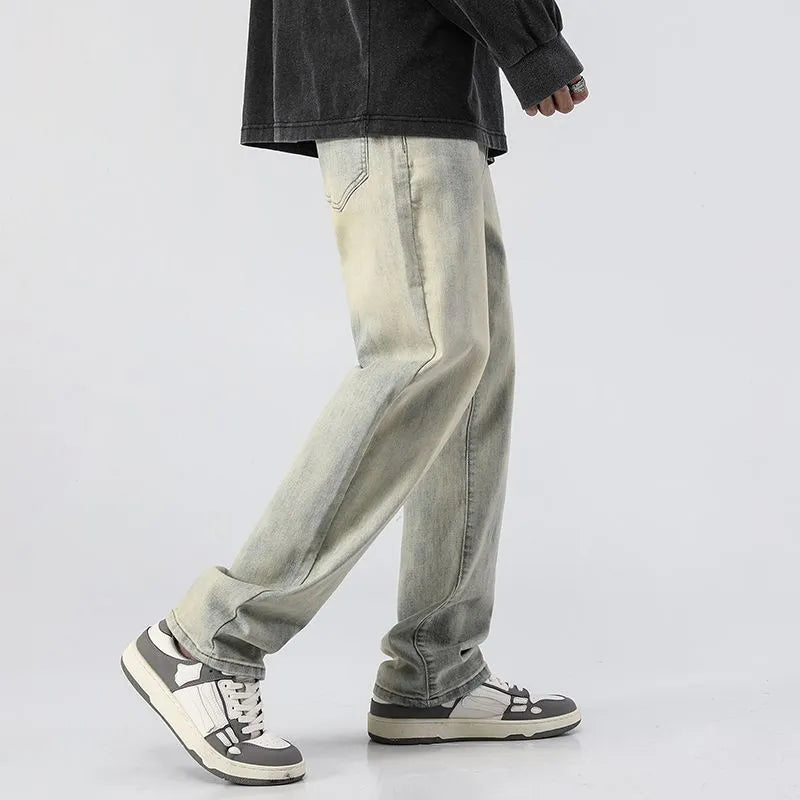 Men's washed distressed slim straight cotton tapered pants in Cement Yellow