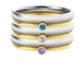 Geometric engraved titanium steel ring with December birthstone colour accents showing superimposed combination design