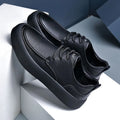 Men's brown casual lace-up shoes with a round toe and flat EVA sole on a white background.