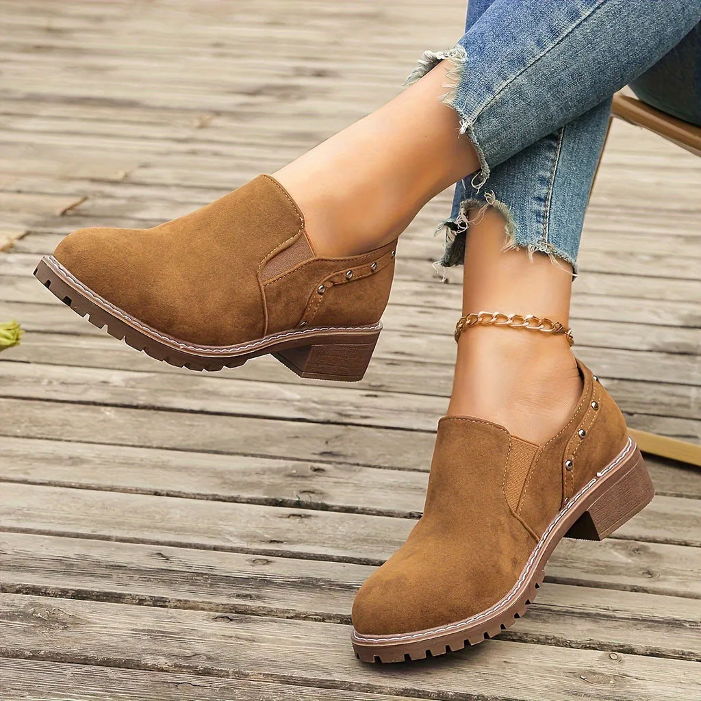 Plus size suede ankle boots with low chunky heel under 3cm, elastic band and metal detail in black or light brown