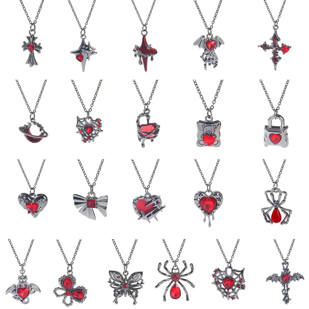 Silver electroplated gothic Halloween necklace with bat and spider pendant designs on a chain.