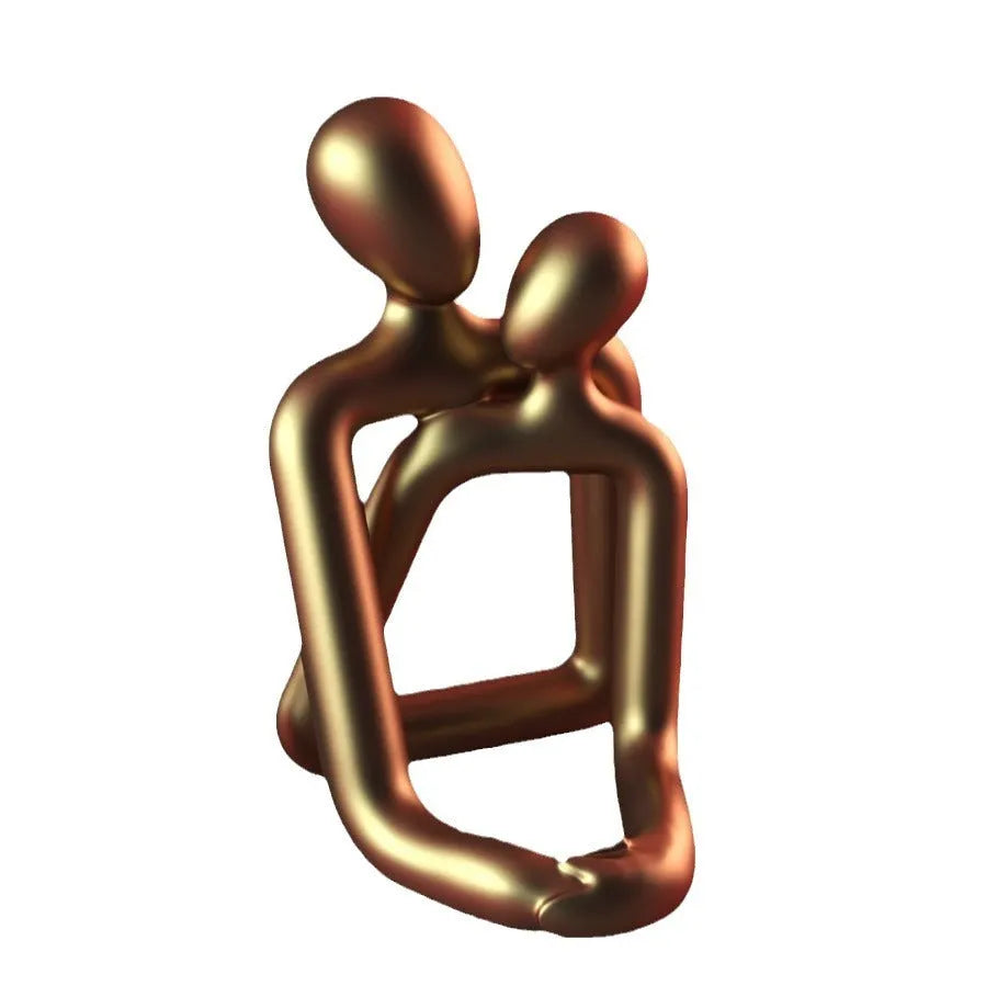 A modern style loving couple resin statue in either milky white or gold finish.