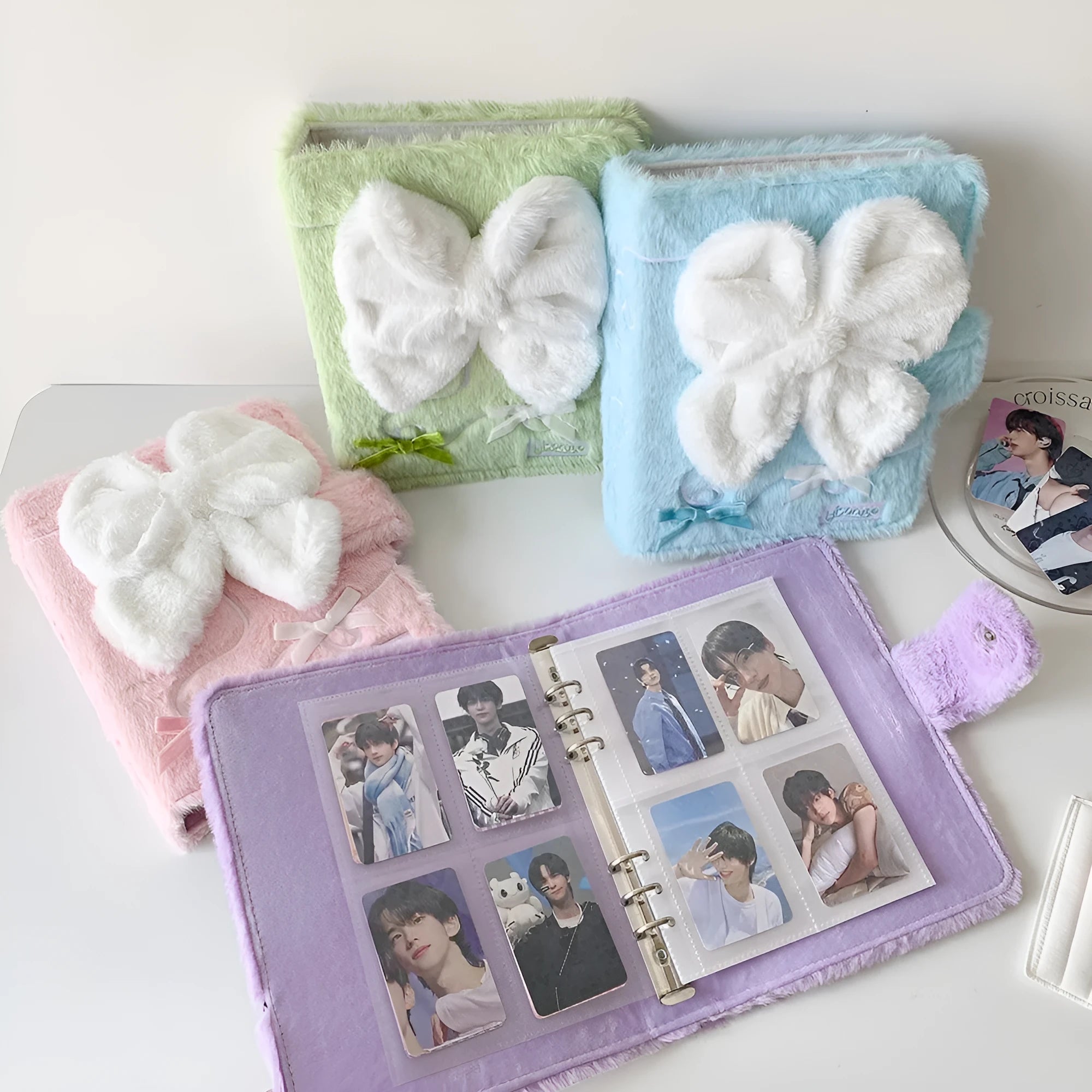 Pink plush bow A5 photo album with loose-leaf rings, open showing blank inner pages