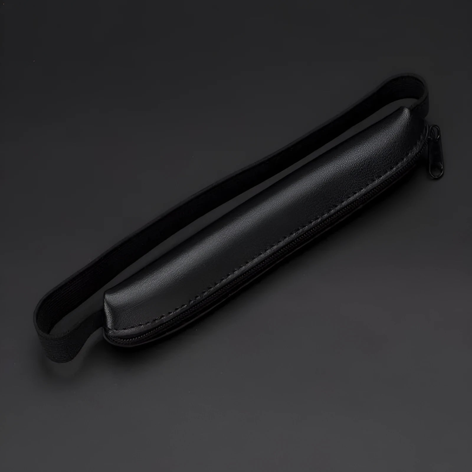 Long slim PU leather pencil case in beige grey, black, black crocodile pattern, and brown crocodile pattern.