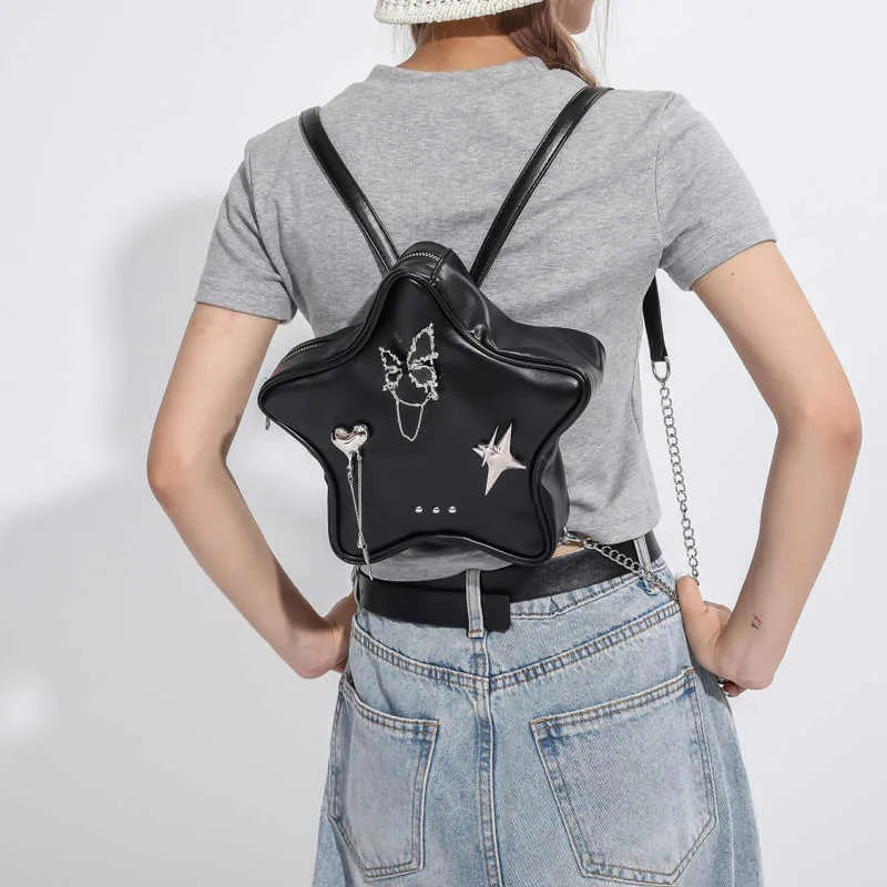 Soft black PU leather women's shoulder bag worn cross-body and as a mini backpack