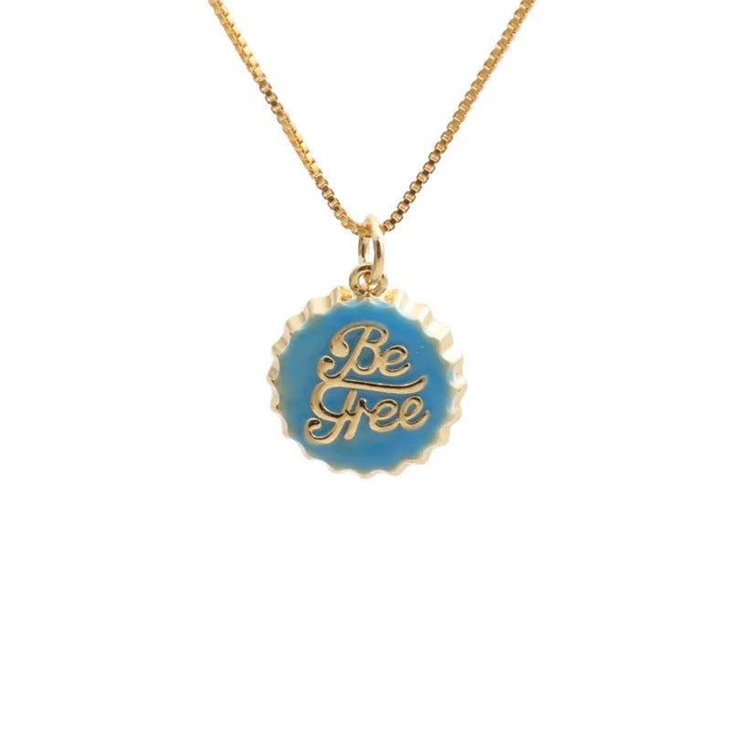 Copper bottle cap pendant necklace on a 40cm box chain with an 18K gold electroplated finish.