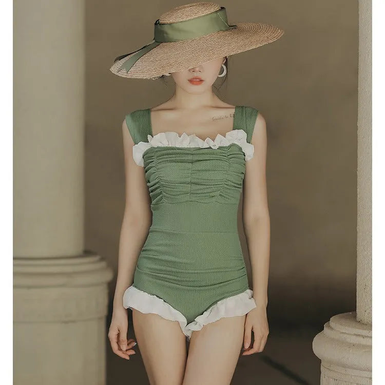 Korean style triangle top one-piece swimsuit for women with high waist in black colour.