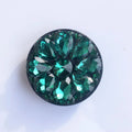 Rhinestone adhesive ring bracket phone holder for desktop in various colours on a wooden table.