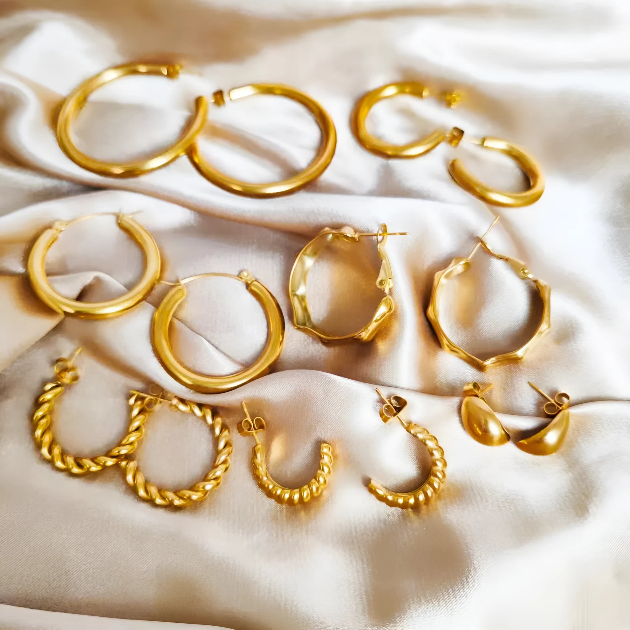 Women's stainless steel irregular twisted asymmetric earrings in gold finish