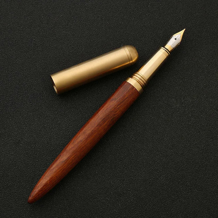 Brass and solid wood signature pen showing wood grain and metal details