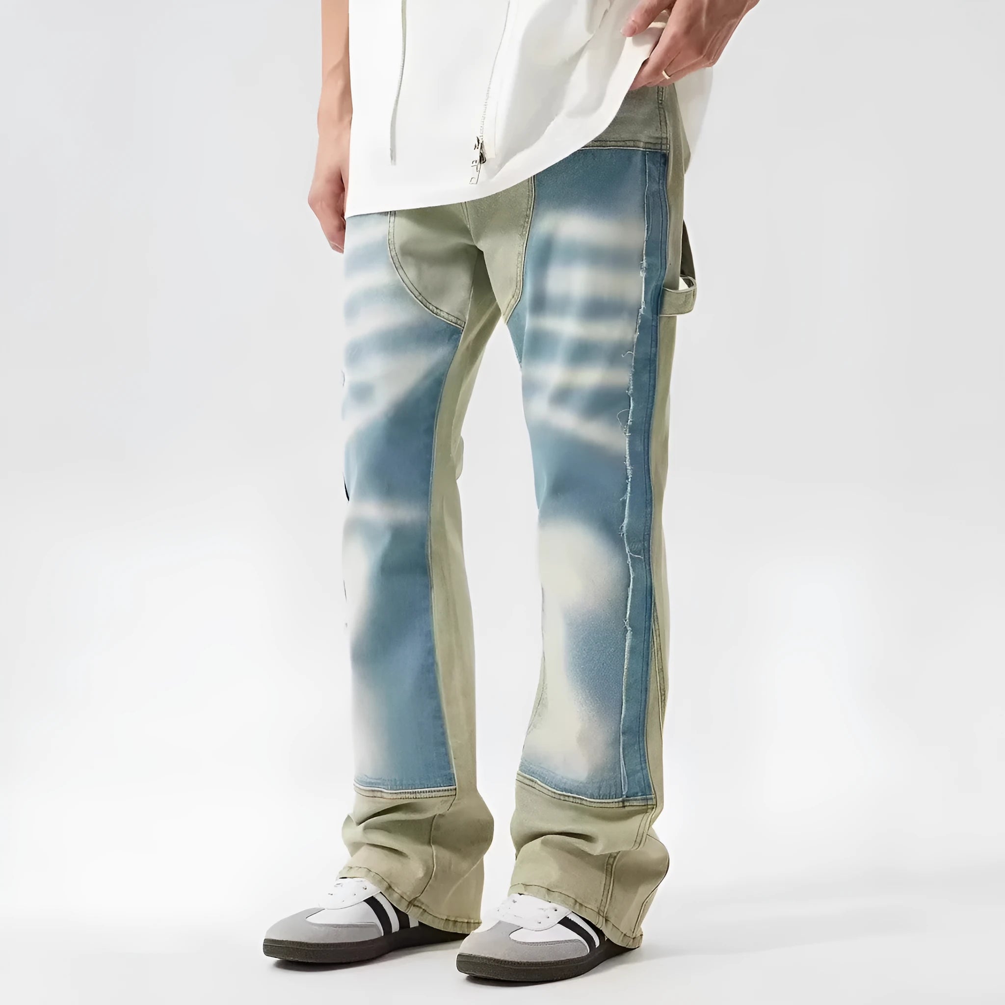 Retro yellow and blue patchwork jeans with splash-ink and damaged design details.
