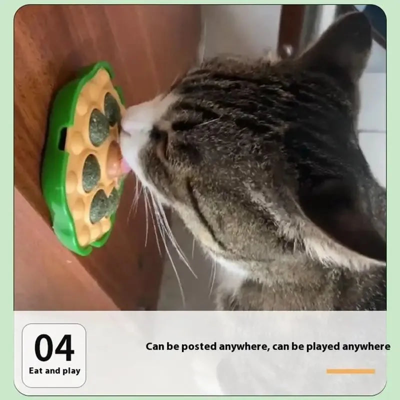 Green lotus-shaped adhesive catnip ball toy for cats, shown with dimensions approximately 10.5cm.