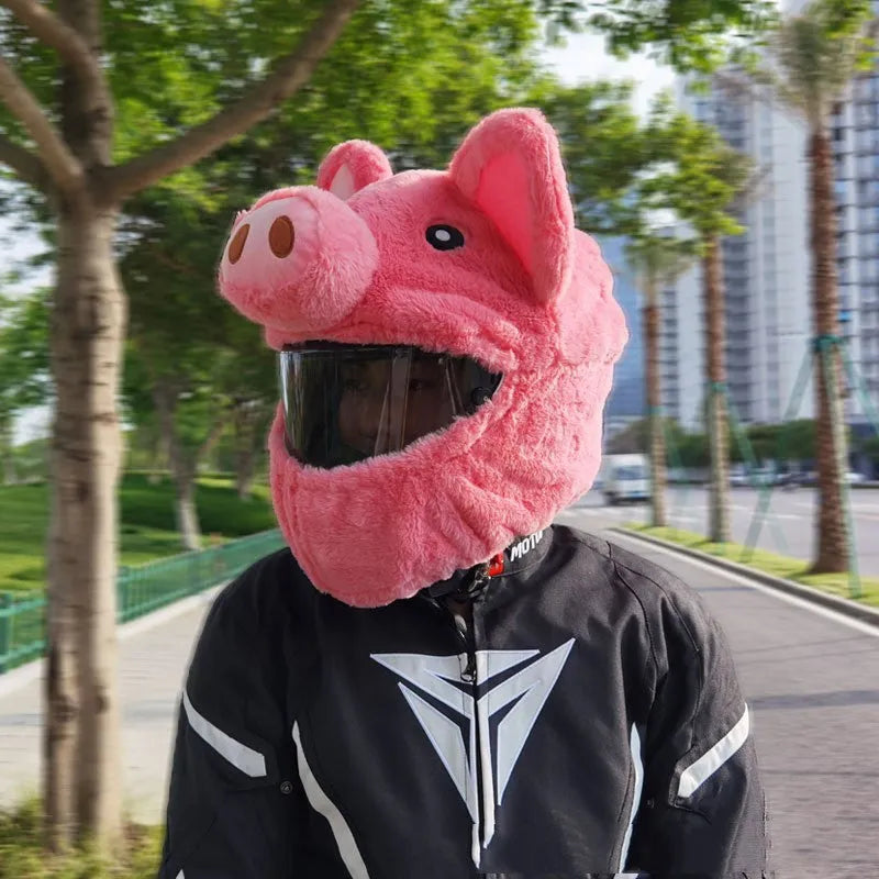 Pink pig cartoon design plush hood for wearing under a motorcycle helmet.