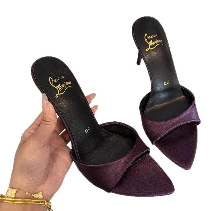 Women's black patent leather stiletto sandals with 8cm heel, pointed toe, and ankle strap