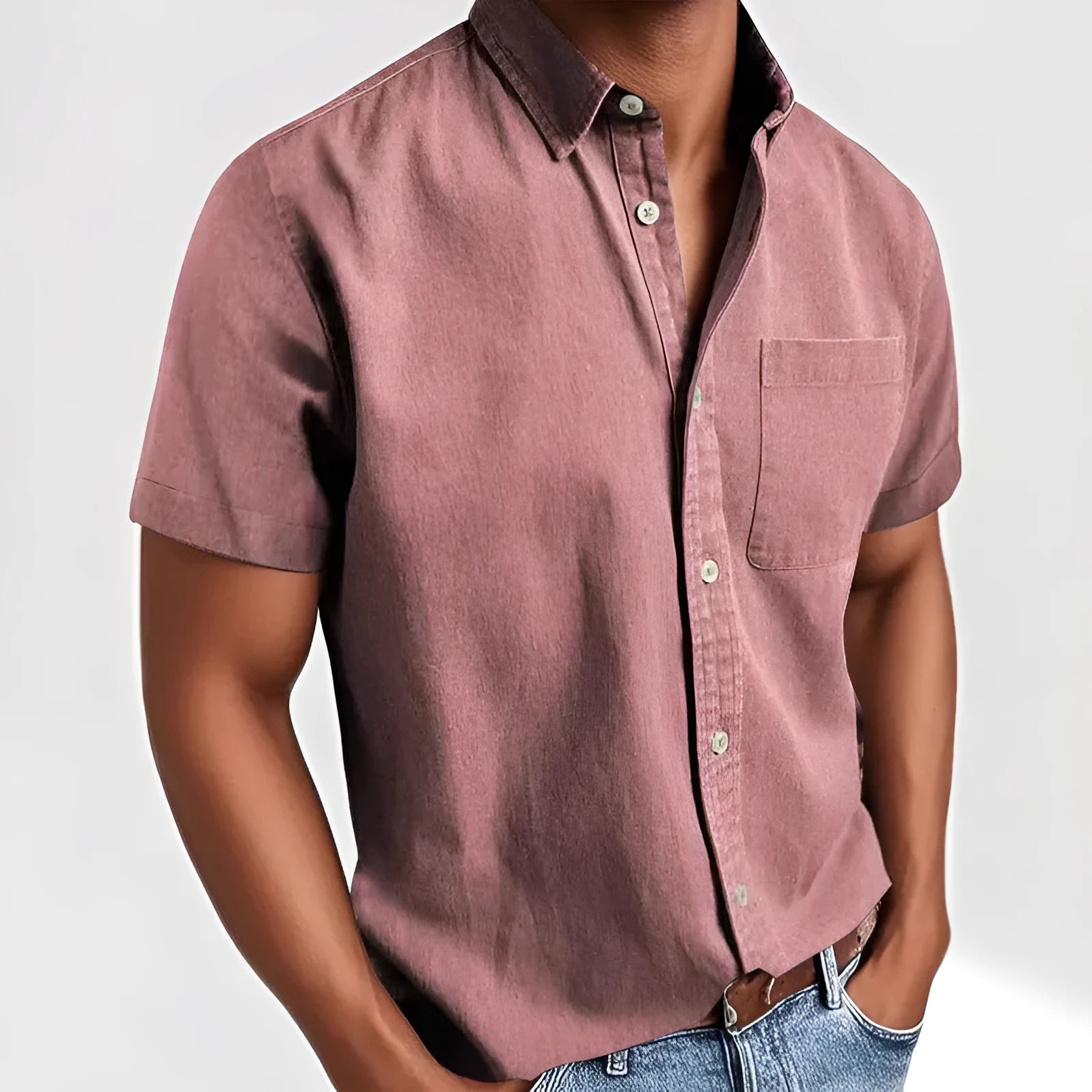 Men's solid colour short sleeve polo shirt with a chest pocket and polo collar on a hanger.