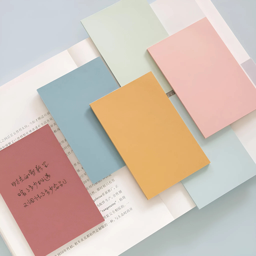 Large 12cm by 8cm colourful Post-it notes showing six different colours in a self-adhesive sticky note pack