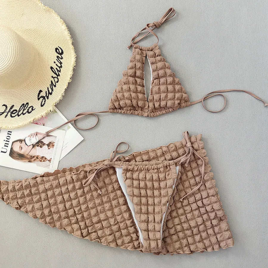 Brown seersucker lace-up bikini top with matching pants and skirt, three-piece women's swimsuit set