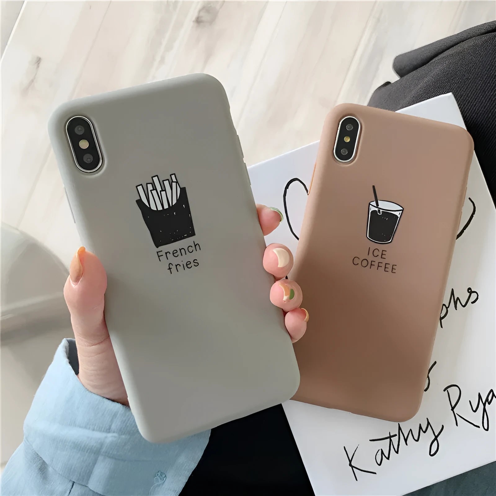 Silicone iPhone case with ice coffee and french fries couple designs on matte background