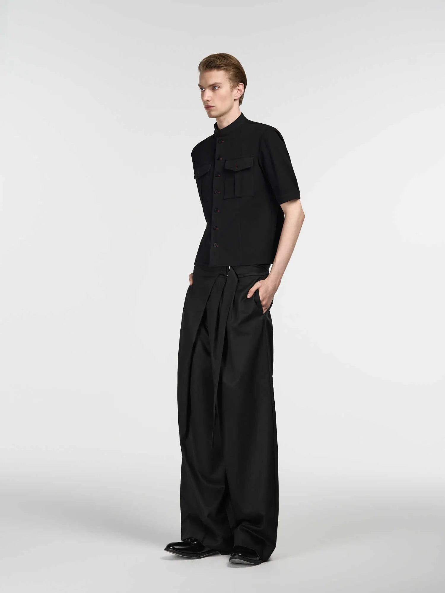 Black straight-leg trousers with adjustable waist and single pleat front in Tencel cotton fabric