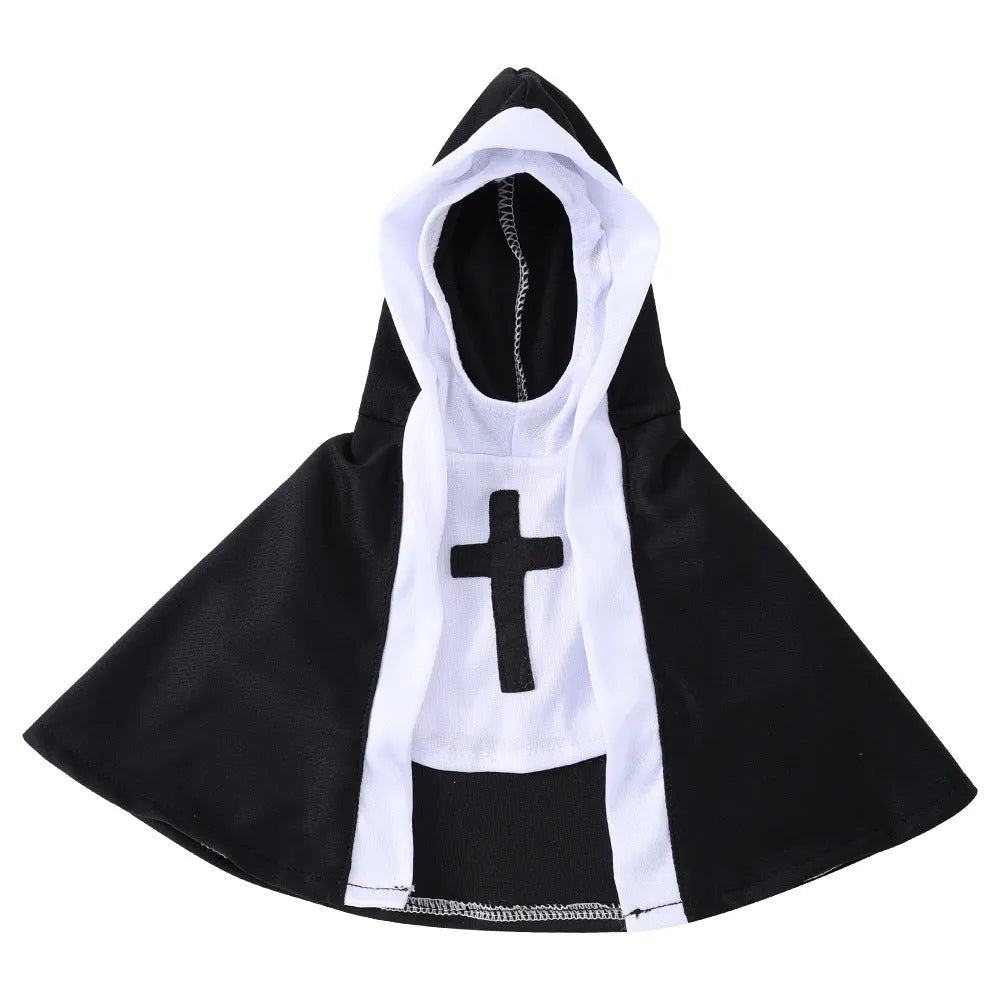 Cat wearing a black polyester nun cloak pet costume for Halloween with white collar