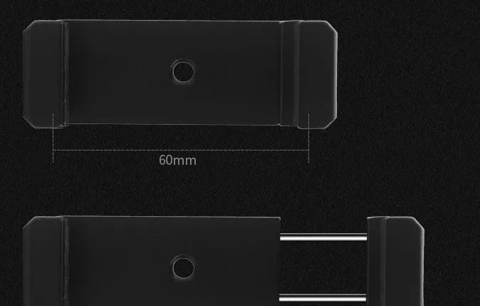 Silver aluminium smartphone bracket for tripod mounting next to a mobile phone.