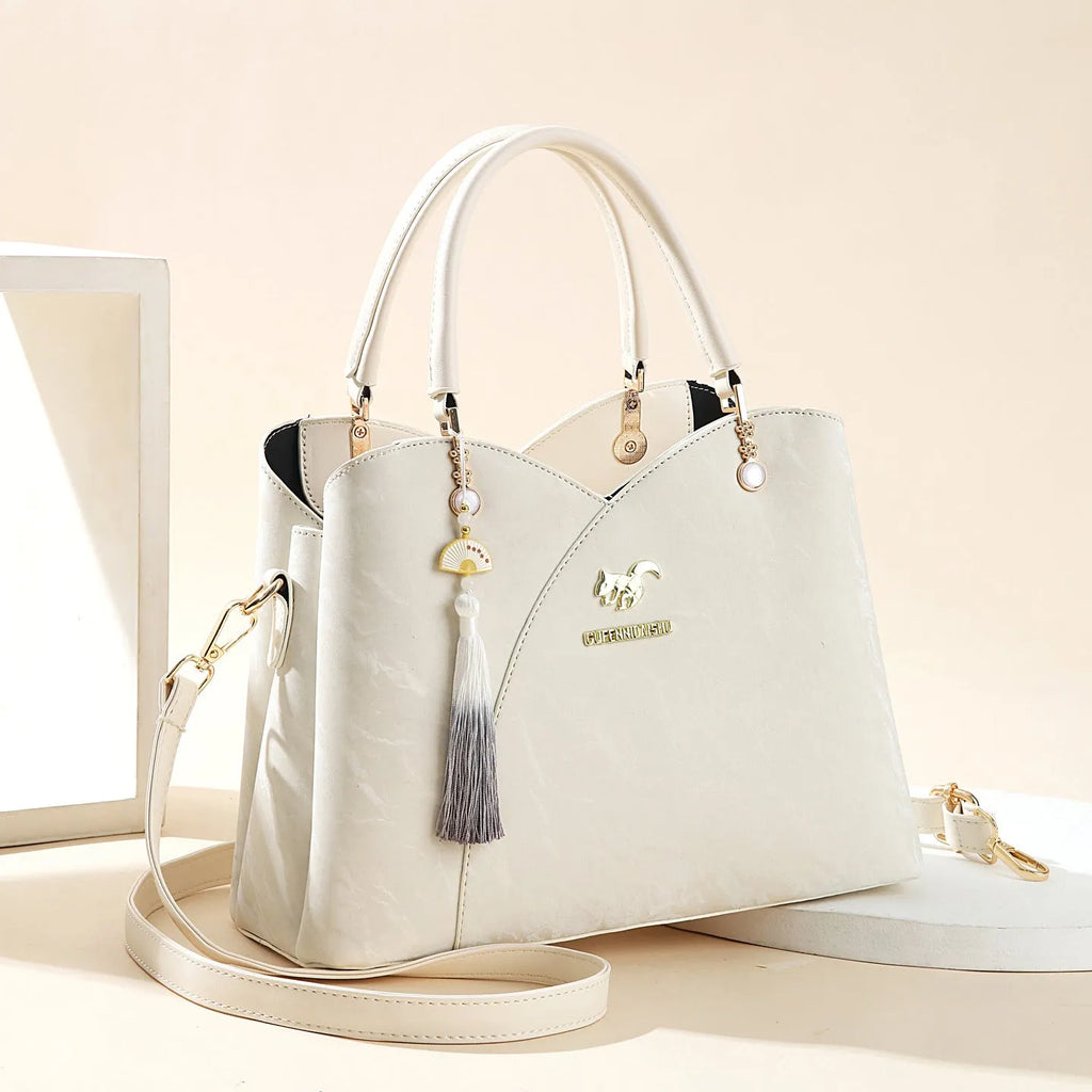 Women's soft PU messenger bag in horizontal square shape with sewing thread detailing