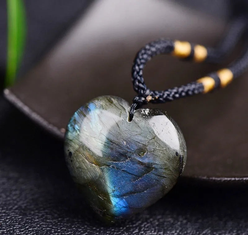 Blue labradorite moonstone heart of the ocean geometric pendant necklace on a chain.
